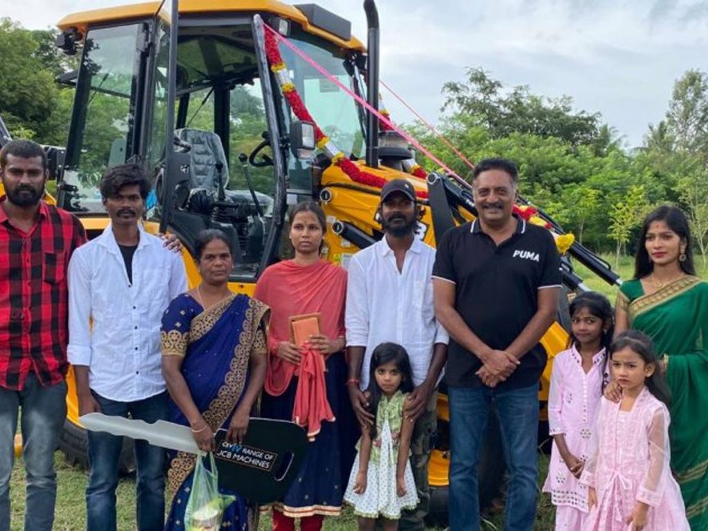 Prakash Raj Giving A Jcb Gift To A Poor Family