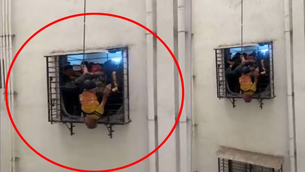 Surat Man Slips From 10th Floor Window Dangles From 8th Floor Grille Rescued Video Viral