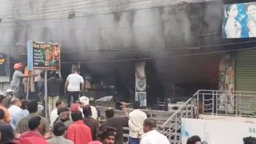Gudivada Fire Accident Massive Blaze At Nehru Chowk Causes Crores In Property Loss