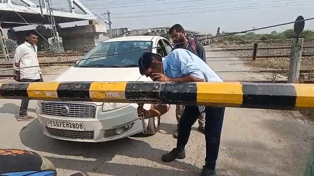 Car Stopped On Railway Tracks In Peddapalli