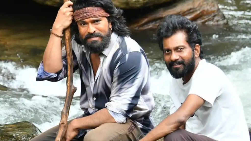 Ram Charan Peddi Movie Faces Sc St Atrocity Case Demand By Tribal Groups Buchi Babu Sana