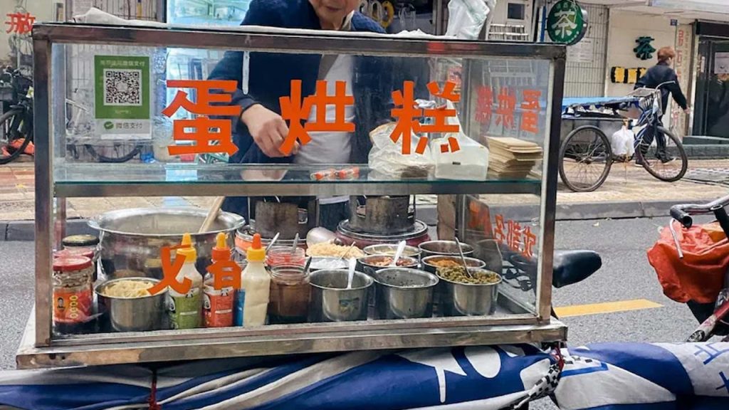 19 Year Old Chinese Vendor Wears Suit Sells Fried Rice Viral Story