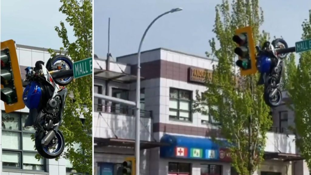 Motorcycle Hangs From Traffic Signal After Shocking Crash In Canada