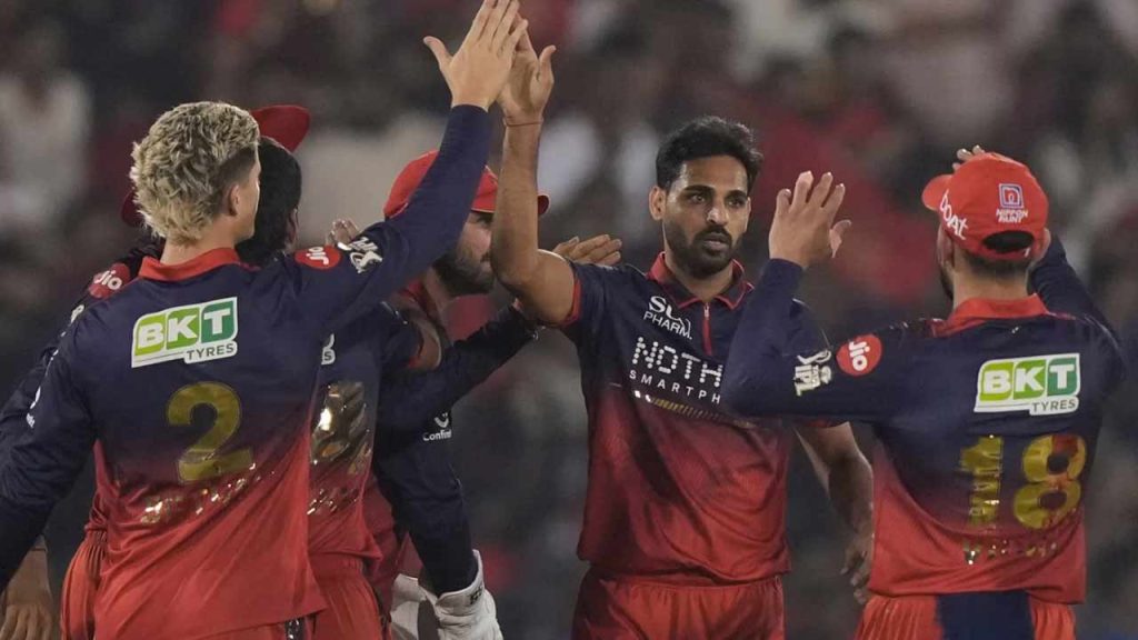 Rcb Bowlers Dominate Mumbai Bhuvneshwar Kumar Four Wickets